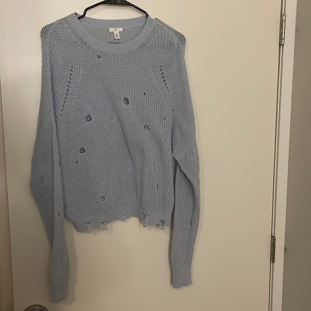 Sweater with holes